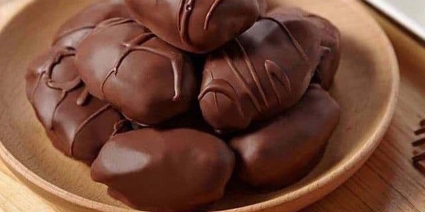 تصویر 3 از قیمت خرید شکلات مغزدار خرمایی + فروش ویژه